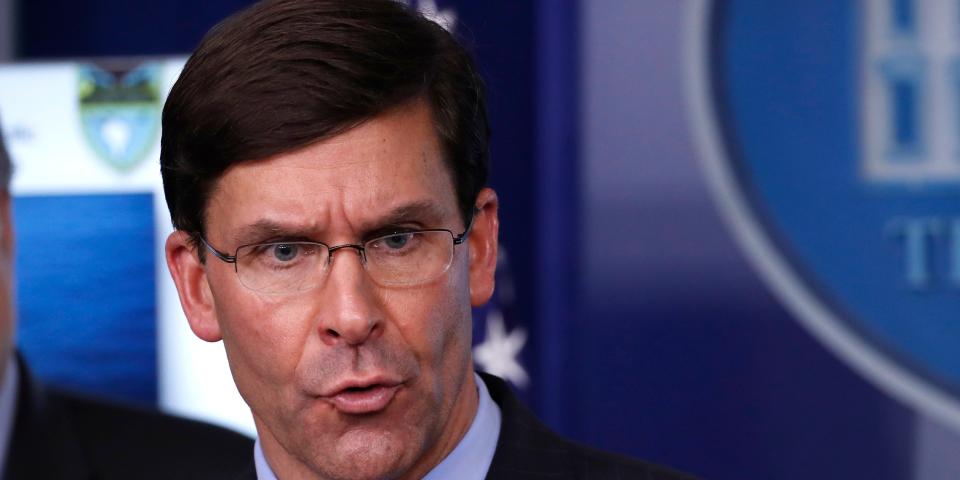 FILE - In this April 1, 2020, file photo, Defense Secretary Mark Esper speaks about the coronavirus in the James Brady Press Briefing Room of the White House in Washington. The U.S. military is bracing for a months-long struggle against the coronavirus. It is looking for novel ways to maintain a defensive crouch that protects the health of troops without breaking their morale. (AP Photo/Alex Brandon, File)