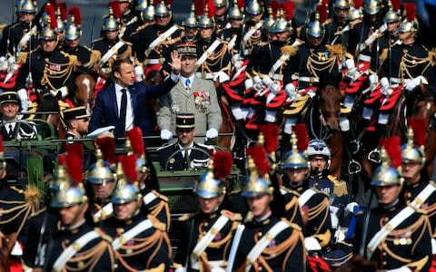 Donald Trump was impressed by France's annual Bastille Day parade - Credit: Gonzalo Fuentes/Reuters