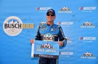 May 10, 2019; Kansas City, KS, USA; NASCAR Cup Series driver Kevin Harvick (4) poses for a picture after winning the pole for the Digital Ally 400 at Kansas Speedway. Mandatory Credit: Jasen Vinlove-USA TODAY Sports