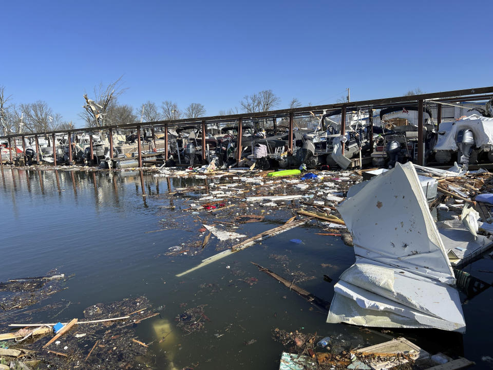 Damaged boat docks after severe weather on Orchard Island in Russells Point, Ohio, on Saturday, March 16, 2024. Thursday night’s storms left trails of destruction across parts of Ohio, Kentucky, Indiana and Arkansas. An Ohio sheriff in what appeared to be the hardest hit area says it's a surprise more people weren't killed in Thursday night's storms. (AP Photo/Patrick Orsagos)