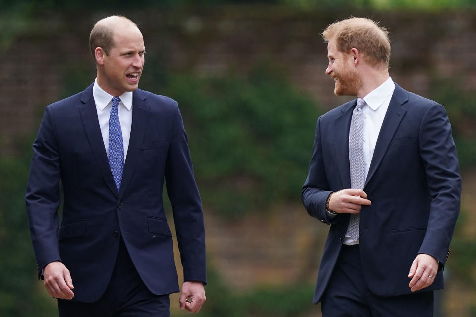 Britain's Prince William, Duke of Cambridge, (L) and Britain's Prince Harry, Duke of Sussex, arrive for the unveiling of a statue of their mother, Princess Diana at The Sunken Garden in Kensington Palace, London on July 1, 2021, which would have been her 60th birthday. - Princes William and Harry set aside their differences on Thursday to unveil a new statue of their mother, Princess Diana, on what would have been her 60th birthday. (Photo by Yui Mok / POOL / AFP) (Photo by YUI MOK/POOL/AFP via Getty Images)