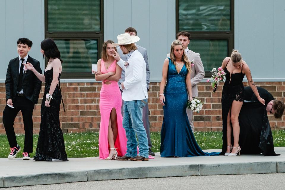 Students line up to be announced at Dover High School's prom, Saturday, May 11.