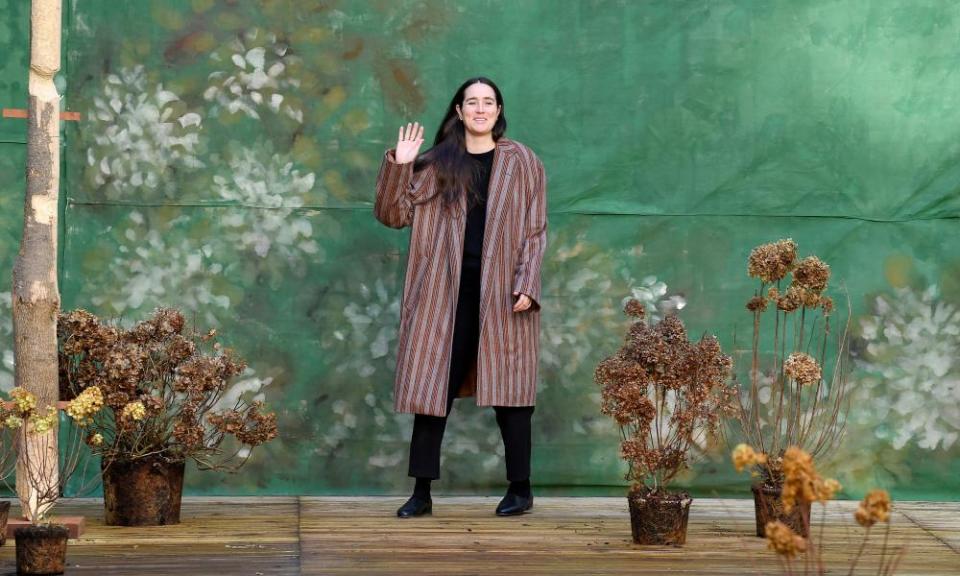 Designer Emily Bode greets the audience at the end of her Fall/Winter 2020-2021 show at Paris Fashion Week.