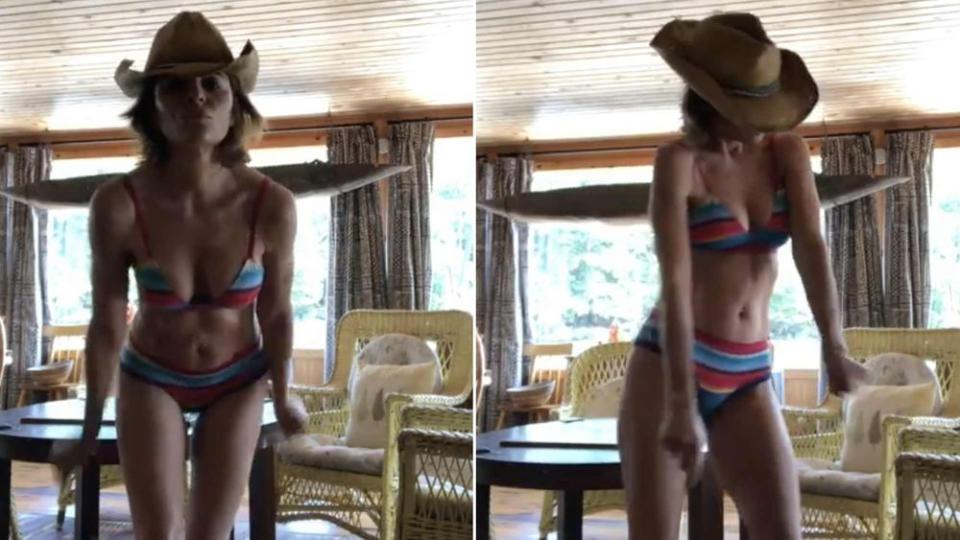 Lisa Rinna dancing in a bikini and cowboy hat