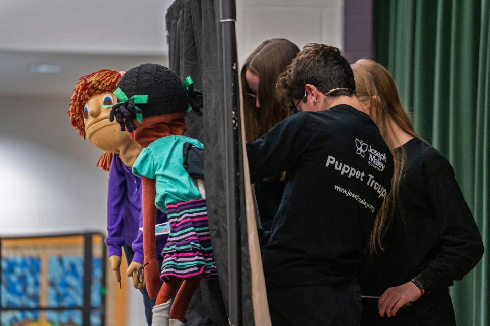 Volunteers with Joseph Maley Foundation's Westfield Middle School Puppet Troupe put on a puppet show about living with disabilities Monday, Nov. 14, 2022 at Washington Woods Elementary School in Westfield.