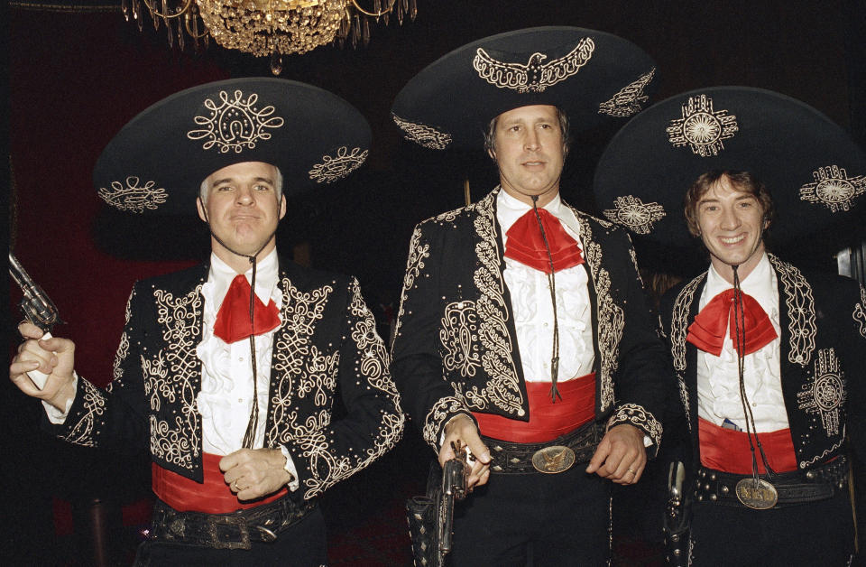 FILE - Steve Martin, from left, Chevy Chase, and Martin Short appear at the premiere of their film "Three Amigos!" in New York on Dec. 9, 1986. Martin is the subject of a new documentary "Steve! (Martin) a Documentary in 2 Pieces." (AP Photo/Frankie Ziths, File)