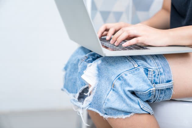 No judgment from us: Working from the toilet is multitasking at its most human. (Photo: Virojt Changyencham via Getty Images)