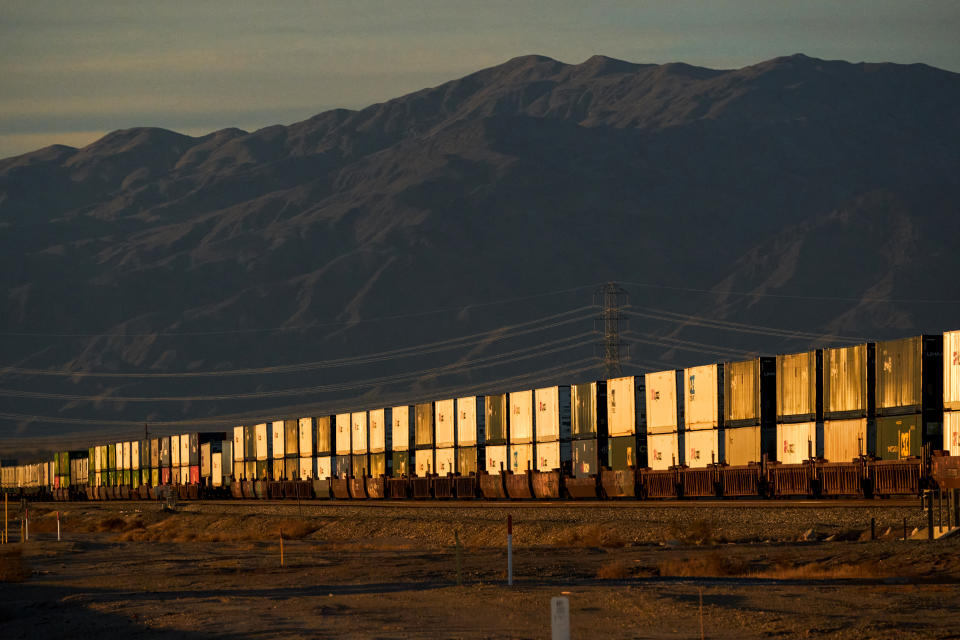 Cargo containers onboard a freight train in Niland, Calif., on Dec. 15, 2021. (Bing Guan / Bloomberg via Getty Images file)