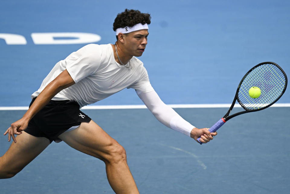 Ben Shelton of the United States plays a forehand return to Taro Daniel of Japan in their semifinal at the ASB Classic tennis tournament in Auckland, New Zealand. Friday Jan. 12, 2024. (Andrew Cornaga/Photosport via AP)