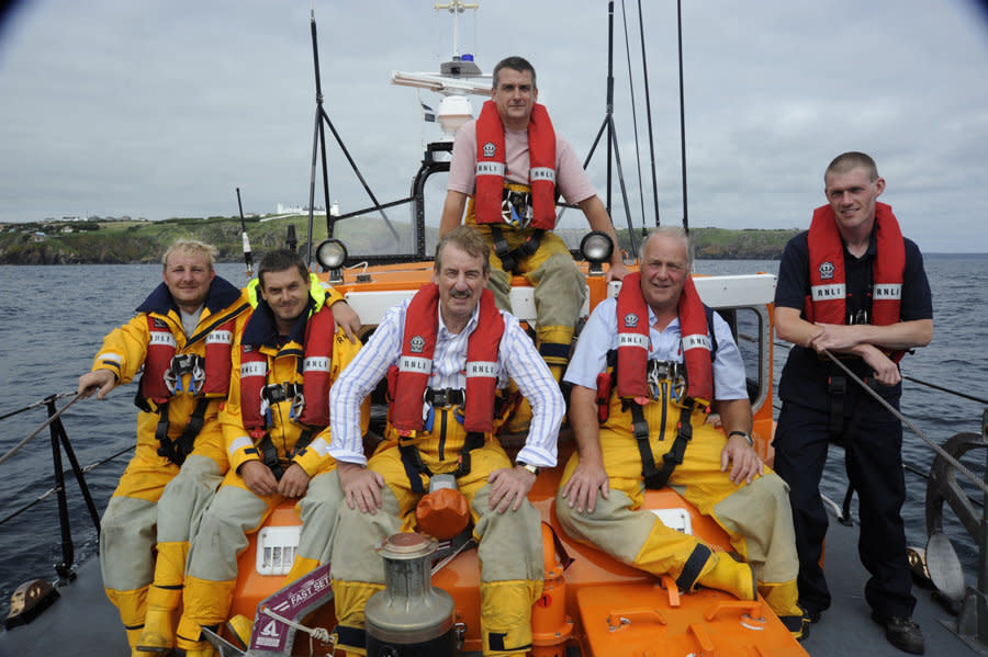 These pictures show Boycie actor John Challis ticking off one of his bucket list wishes before he died - launching down the slipway of a lifeboat station (August 09). See SWNS story SWPLboycie; Tributes have been paid to John Challis, best known for playing Boycie in BBC sitcom Only Fools and Horses, who has died at the age of 79. His family said he died 