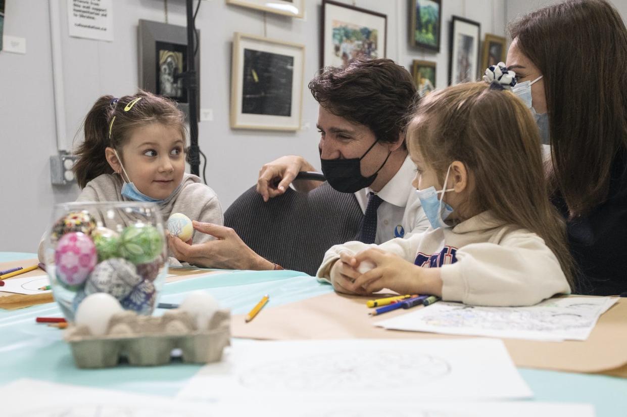 <span class="caption">Prime Minister Justin Trudeau paints Easter eggs with newly arrived Ukrainian and Iranian children at the Ukrainian Community Outreach Centre in Edmonton on April 12. </span> <span class="attribution"><span class="source">THE CANADIAN PRESS/Jason Franson</span></span>