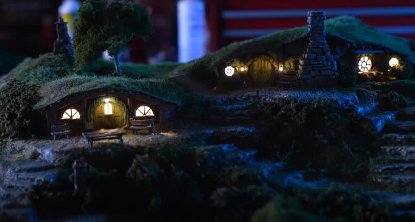 A view of the Shire wargaming diorama recreating a nighttime scene.