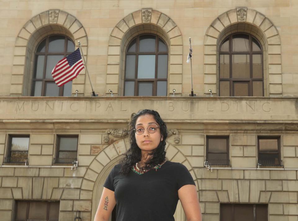 Parinita Singh stands outside of Akron City Hall. Singh would like to see inclusivity in Akron City Council prayers or to do away with it entirely.