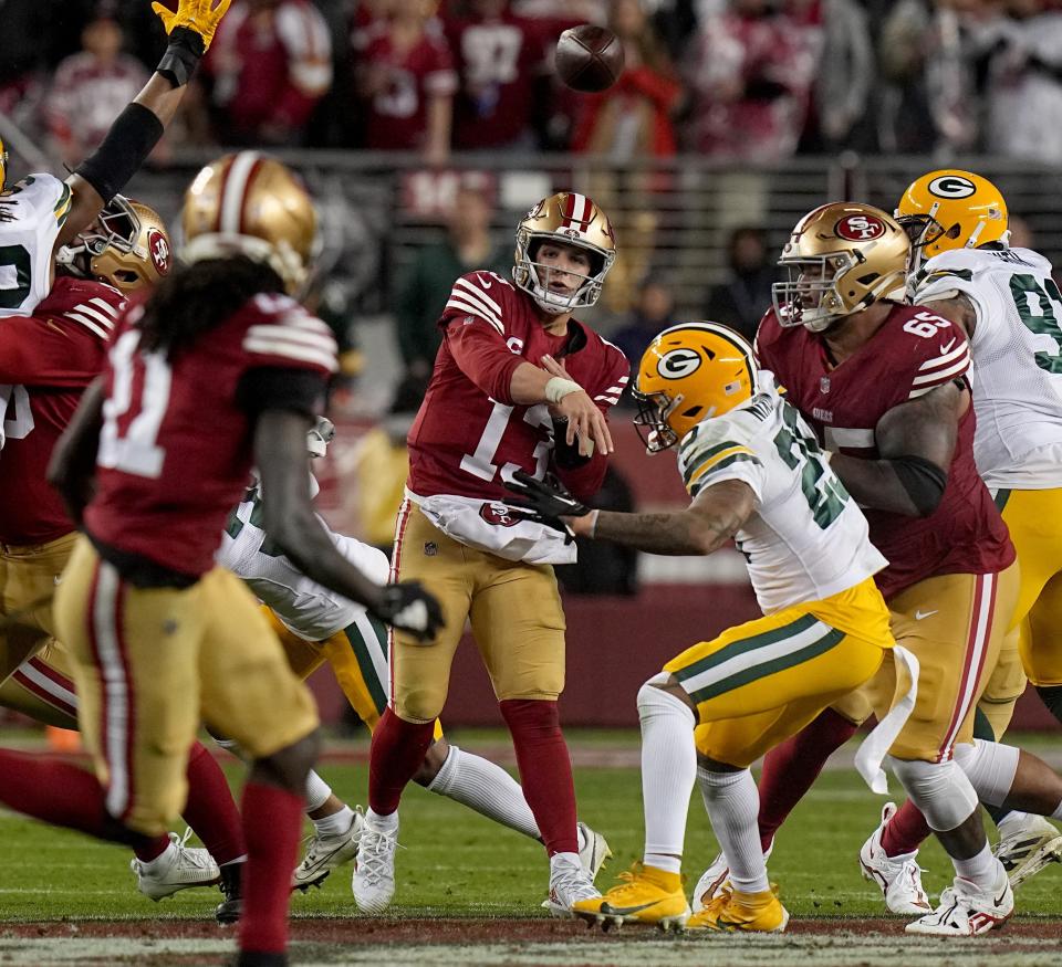 San Francisco 49ers quarterback Brock Purdy throws a pass during the third quarter of their NFC divisional playoff game Saturday, Jan. 20, 2024 at Levi's Stadium in Santa Clara, Calif.