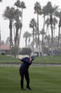 Phil Mickelson hits from the fairway on the fourth hole during the first round of the Desert Classic golf tournament at La Quinta Country Club on Thursday, Jan. 17, 2019, in La Quinta, Calif. (AP Photo/Chris Carlson)