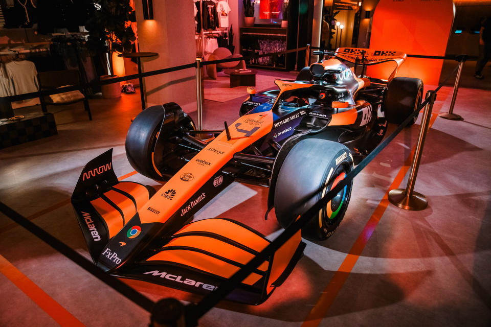 The McLaren Formula 1 race car inside Abercrombie & Fitch on Fifth Avenue. 