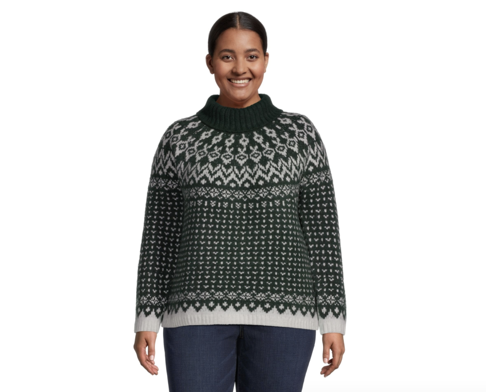 model wears dark green WindRiver Women's Heritage Fair Isle Semi Fitted Turtleneck Pullover