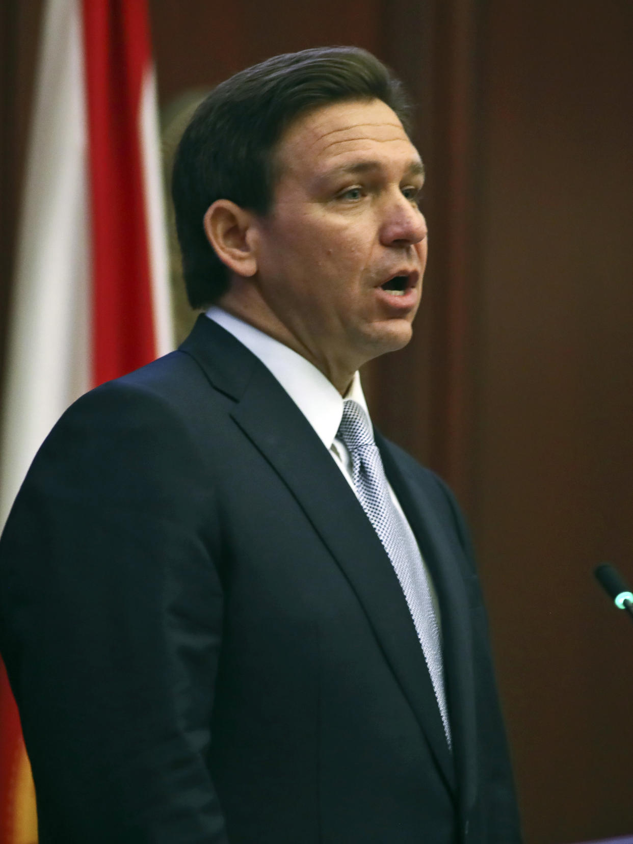 Florida Gov. Ron DeSantis gives his State of the State address during a joint session of the Senate and House of Representatives Tuesday, March 7, 2023, at the Capitol in Tallahassee, Fla. (AP Photo/Phil Sears)