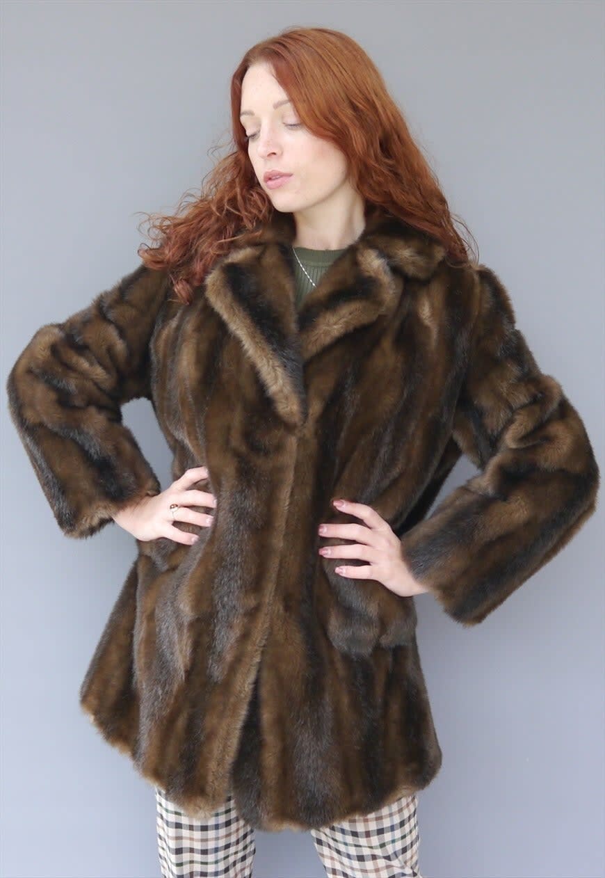 <br><br><strong>Emz Gemz</strong> Vintage 70s brown faux fur coat, $, available at <a href="https://marketplace.asos.com/listing/coats/vintage-70s-brown-faux-fur-coat/5972398?" rel="nofollow noopener" target="_blank" data-ylk="slk:asos marketplace" class="link ">asos marketplace</a>