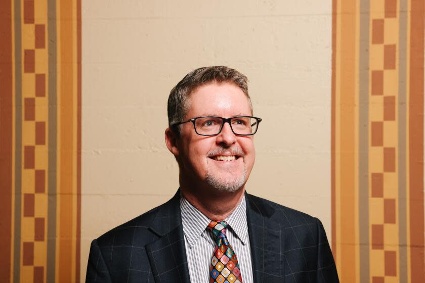 Los Angeles, - January 03: City Librarian of the Los Angeles Public Library John Szabo poses for a portrait at his office in the Central Library on Wednesday, Jan. 3, 2024 in Los Angeles, . The LA Public Library will be taking over Angel City Press. (Dania Maxwell / Los Angeles Times)