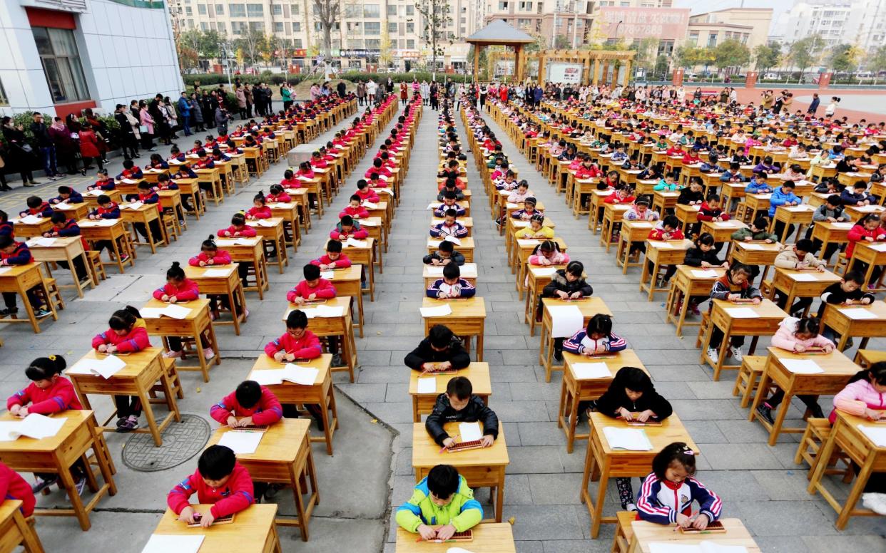 China's heavy workload for children has been criticised - Photoshot/Avalon