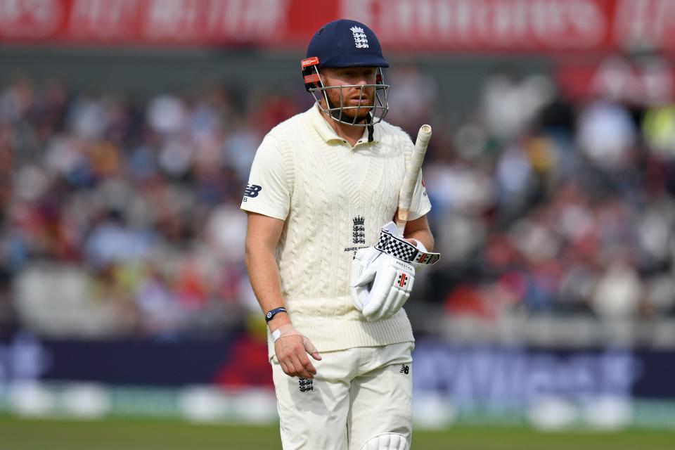England's Jonny Bairstow reacts as he walks back to the pavilion after losing his wicket for 25 during play on the fifth day of the fourth Ashes cricket Test match between England and Australia at Old Trafford in Manchester, north-west England on September 8, 2019. (Photo by Oli SCARFF / AFP) / RESTRICTED TO EDITORIAL USE. NO ASSOCIATION WITH DIRECT COMPETITOR OF SPONSOR, PARTNER, OR SUPPLIER OF THE ECB        (Photo credit should read OLI SCARFF/AFP/Getty Images)