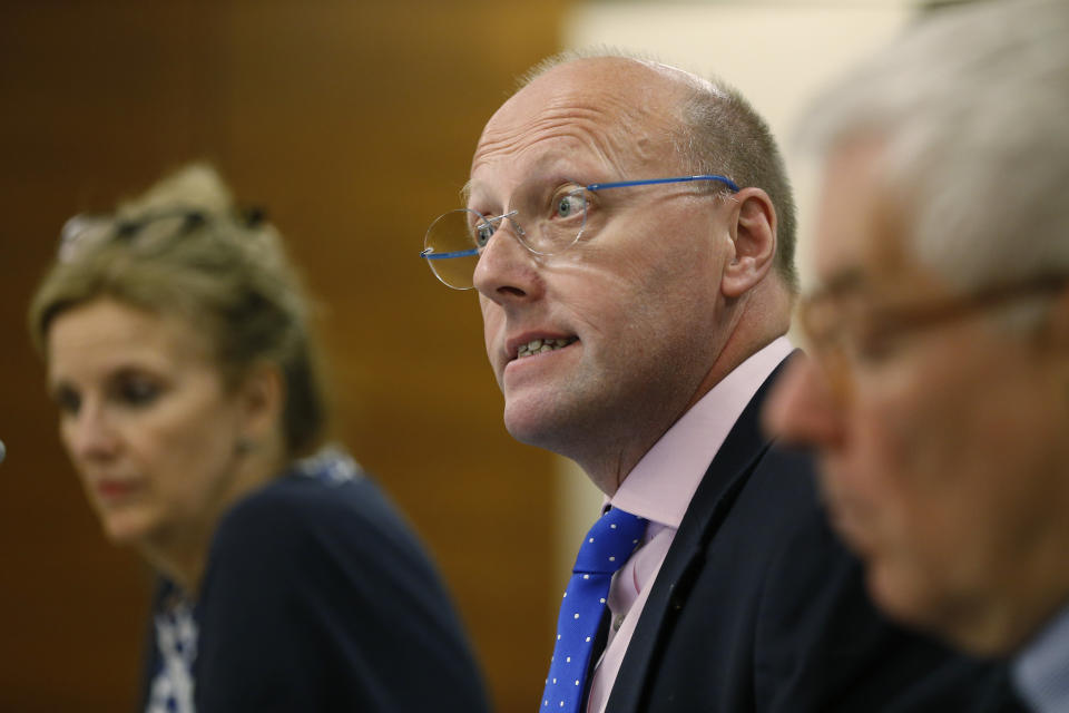 Andrew Dawson, centre, Head of the Delegation of the Congress of Local and Regional Authorities, Council of Europe, talks during a media conference in Istanbul, Monday, June 24, 2019. The head of the monitoring mission presented preliminary findings a day after the delegation observed the repeat race for Istanbul mayor. Ekrem Imamoglu, the opposition candidate, celebrated a landmark win Sunday in a closely watched election that ended weeks of political tension and broke the long hold President Recep Tayyip Erdogan's party had on leading Turkey's largest city. (AP Photo/Lefteris Pitarakis)