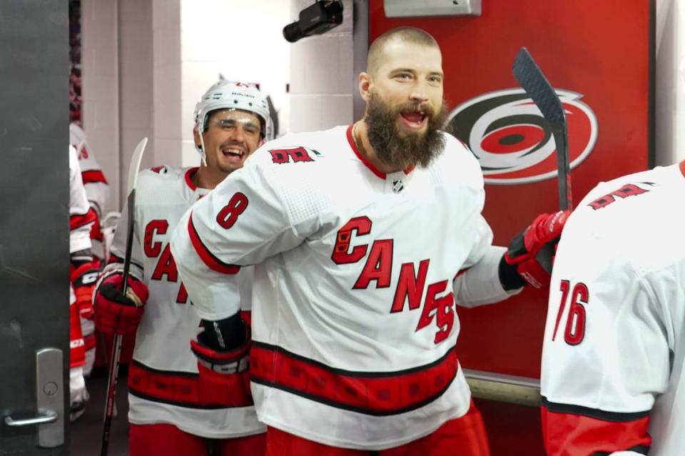 Carolina Hurricanes defenseman Brent Burns (8) and center Seth Jarvis (24) come out of the locker room against the Columbus Blue Jackets before the game at PNC Arena.