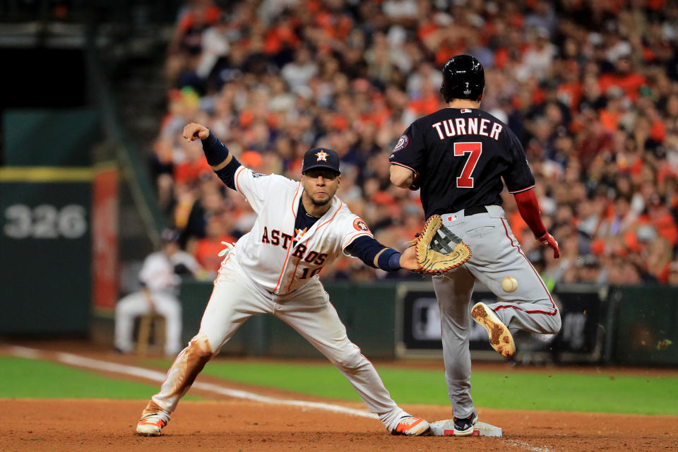 Trea Turner #7 of the Washington Nationals is called out on runner interference for colliding with Yuli Gurriel #10 of the Houston Astros during the seventh inning in Game Six of the 2019 World Series. (Photo by Mike Ehrmann/Getty Images)