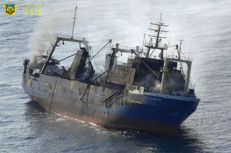Oleg Naydenov, a Russian fishing trawler full of fuel, which caught fire over the weekend in Gran Canaria's port of Las Palmas, can be seen in this handout picture taken April 13, 2015. REUTERS/Spanish Defence Ministry/Handout via Reuters