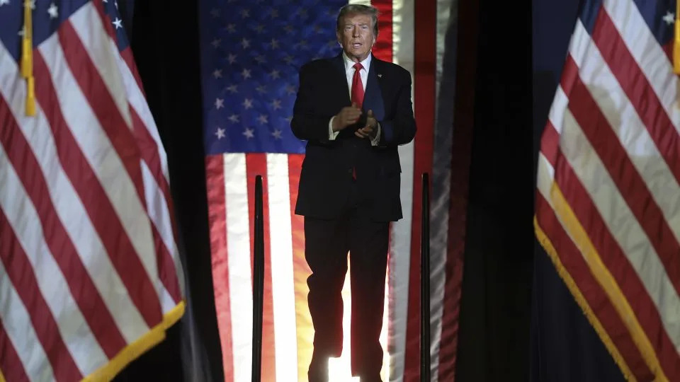 Former President Donald Trump arrives on stage during a Get Out The Vote rally at Coastal Carolina University on February 10 in Conway, South Carolina. - Win McNamee/Getty Images