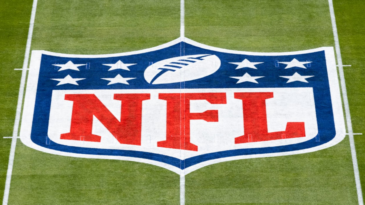  NFL logo at midfield. 