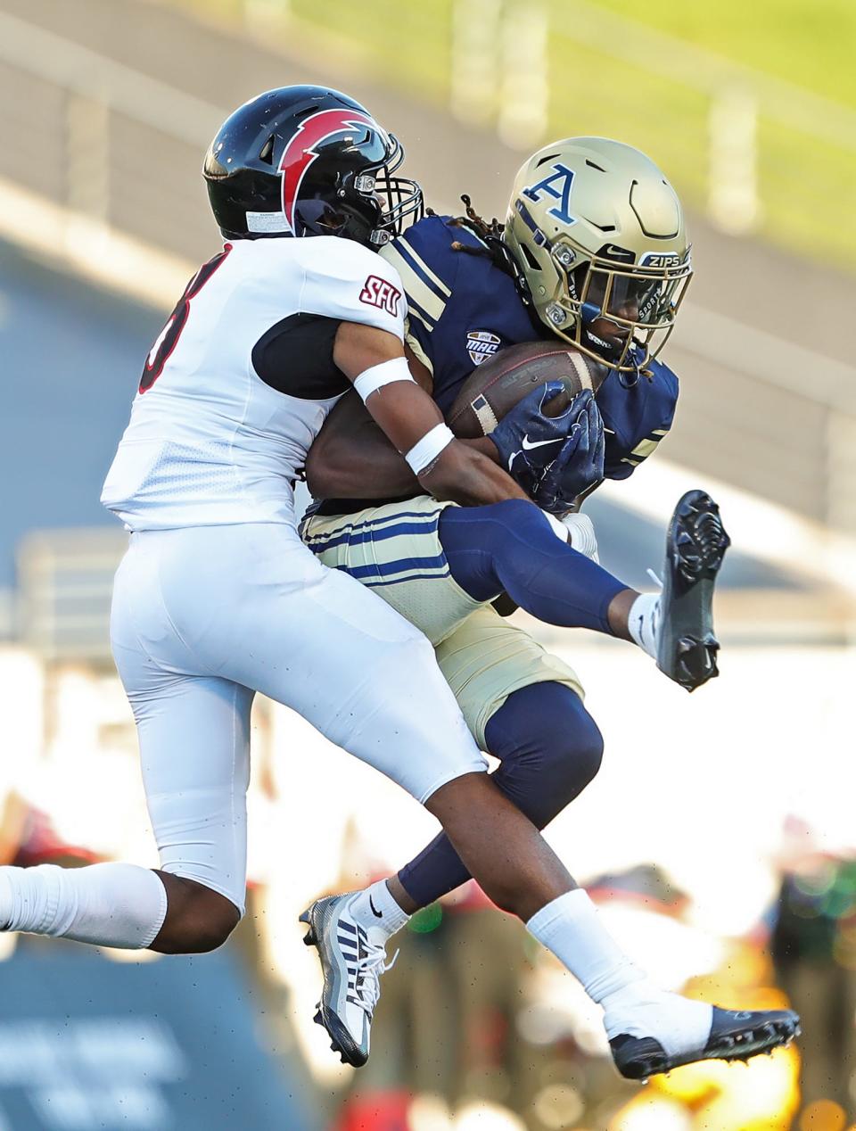 Akron wide receiver Alex Adams makes a first-half catch against St. Francis (Pa.) defensive back Travell Cook, Thursday, Sept. 1, 2022.