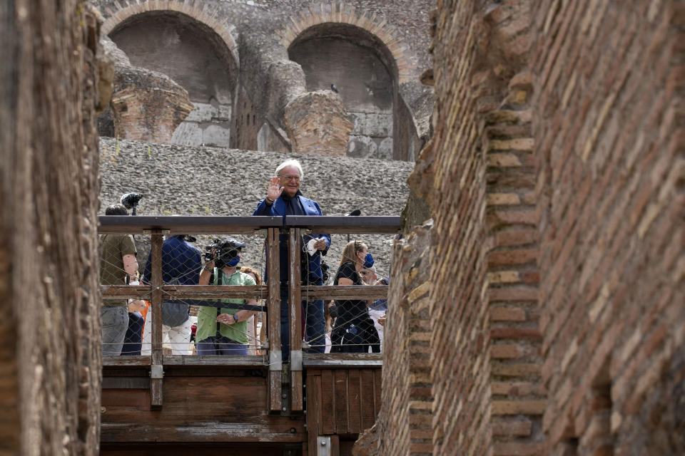 Tod's Diego Della Valle admires the lower level of the Colosseum, in Rome, Friday, June 25, 2021. Italy’s culture minister on Friday formally announced the completion of work to shore-up and restore the underground section, in the presence of the founder of Tod’s, the shoe-and-luxury-goods maker, who has footed the bill. (AP Photo/Andrew Medichini)