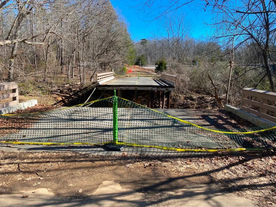 A former roadway, used for years as a pedestrian bridge on the Anne Springs Close Greenway in Fort Mill, collapsed due to rain from heavy storms.