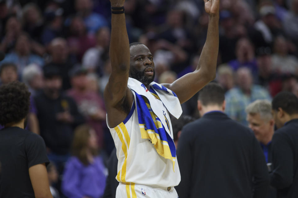 Golden State Warriors forward Draymond Green reacts after he was ejected from Game 2 in the first round of the NBA basketball playoffs for stomping on the chest of Sacramento's Domantas Sabonis, Monday, April 17, 2023, in Sacramento, Calif. (AP Photo/Randall Benton)