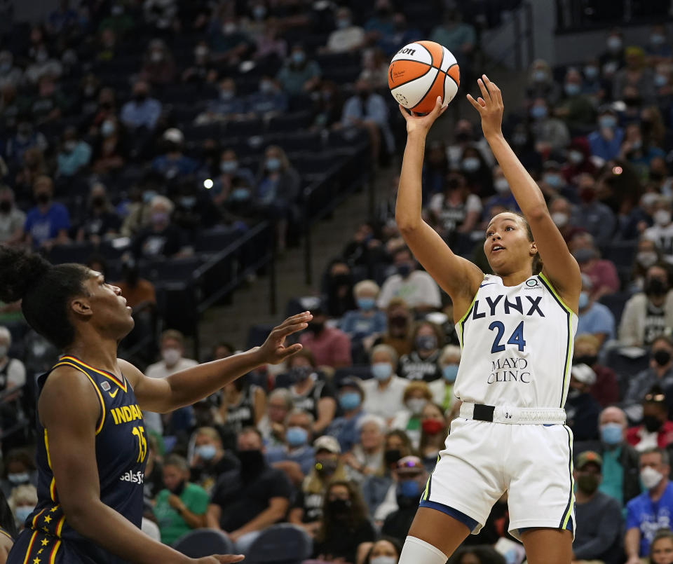 FILE - Minnesota Lynx forward Napheesa Collier (24) shoots over Indiana Fever center Teaira McCowan (15) during a WNBA basketball game, Sunday, Sept. 12, 2021, in Minneapolis. Collier’s return and Diamond Miller’s arrival have given the Minnesota Lynx a fresh look and a new star duo to build around as they try to rebound from a rough season that left them in the rare position of missing the WNBA playoffs.(David Joles/Star Tribune via AP. File)