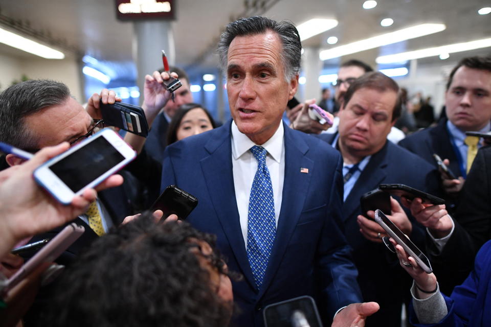 Senator Mitt Romney(R-UT)speaks to the media as he arrives during the impeachment trial of US President Donald Trump on Capitol Hill January 29, 2020, in Washington, DC.