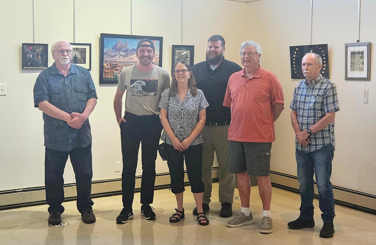 Several winners at the opening night event of the Captured art show at the Pump House Center for the Arts on May 2, 2024.