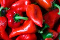 <p>You'll often see these mild red peppers in jars at the grocery store. The name comes from the Spanish word for "little beak." They are great <a href="https://www.delish.com/cooking/recipe-ideas/g3976/arugula-salad-recipes/" rel="nofollow noopener" target="_blank" data-ylk="slk:in a salad;elm:context_link;itc:0;sec:content-canvas" class="link ">in a salad </a>or <a href="https://www.delish.com/cooking/g1590/easy-lunch-sandwiches/" rel="nofollow noopener" target="_blank" data-ylk="slk:on a sandwich;elm:context_link;itc:0;sec:content-canvas" class="link ">on a sandwich</a>. </p><p> Scoville heat units: 500-1,000</p>