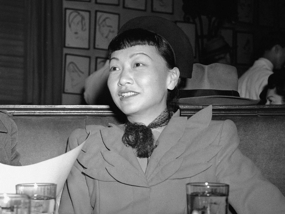 FILE - Chinese American actor Anna May Wong appears at a luncheon at the Brown Derby restaurant in Los Angeles on Oct. 29, 1942. More than 60 years after her death, Wong will be the first Asian American to grace U.S. currency. The U.S. Mint announced it will begin shipping quarters with her likeness later this month. (AP Photo, File)