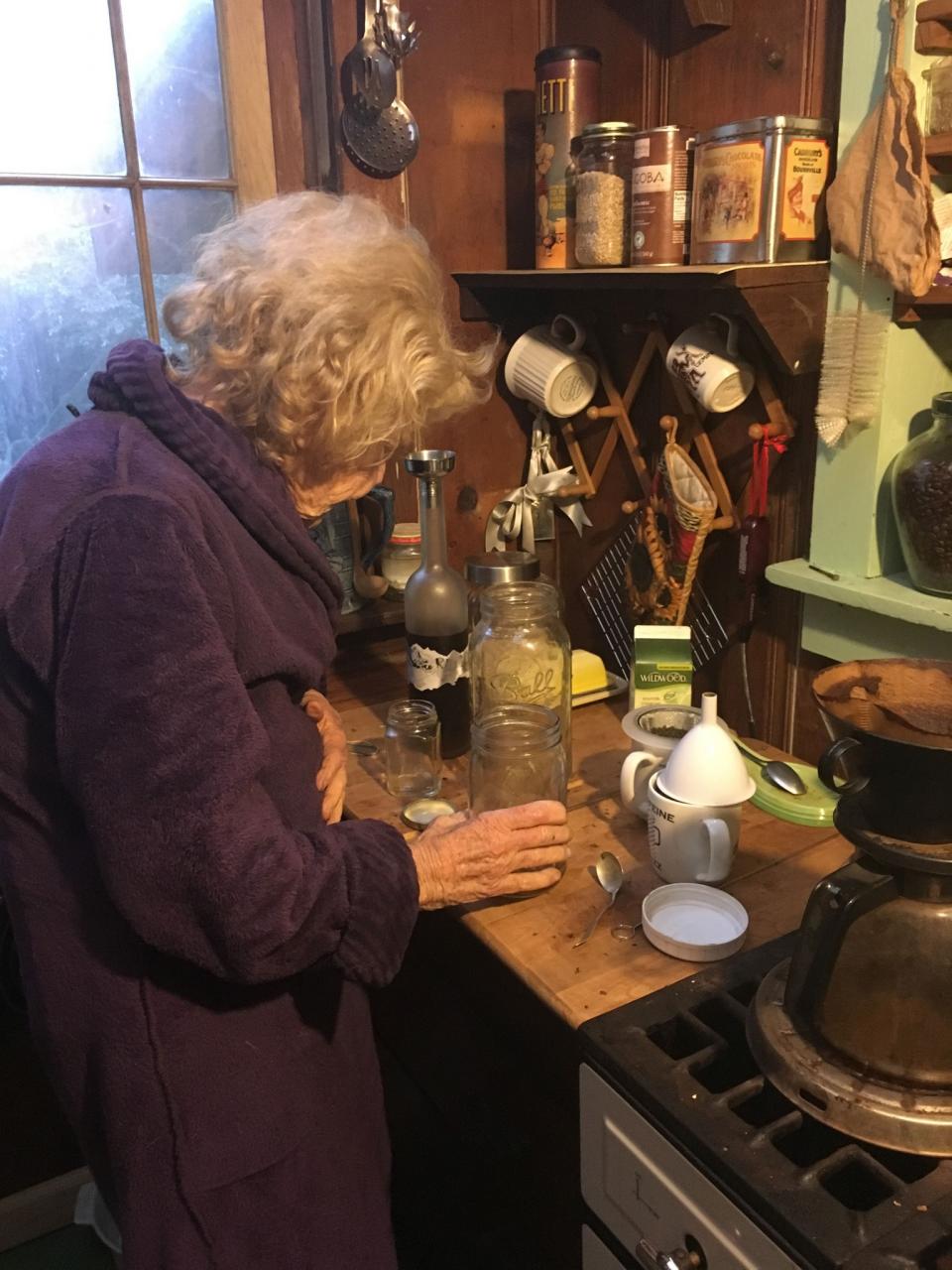 Mary, an 82-year-old former nun, makes herself a tincture of marijuana leaves and Grey Goose vodka, which she says helps her sleep at night. Mary moved to the valley in 1973, and became a poet. (Photo: Deleigh Hermes for Yahoo News)