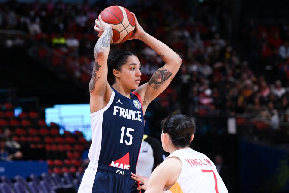 France's Gabby Williams controls the ball during the 2022 Women's Basketball World Cup quarterfinal against China in Sydney, Australia, on Sept. 29, 2022. (Photo by WILLIAM WEST/AFP via Getty Images)