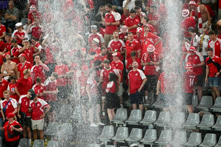 A thunder storm forced referee Michael Oliver to call a halt to the Euro 2024 last 16 match between hosts Germany and Denmark (Alberto PIZZOLI)