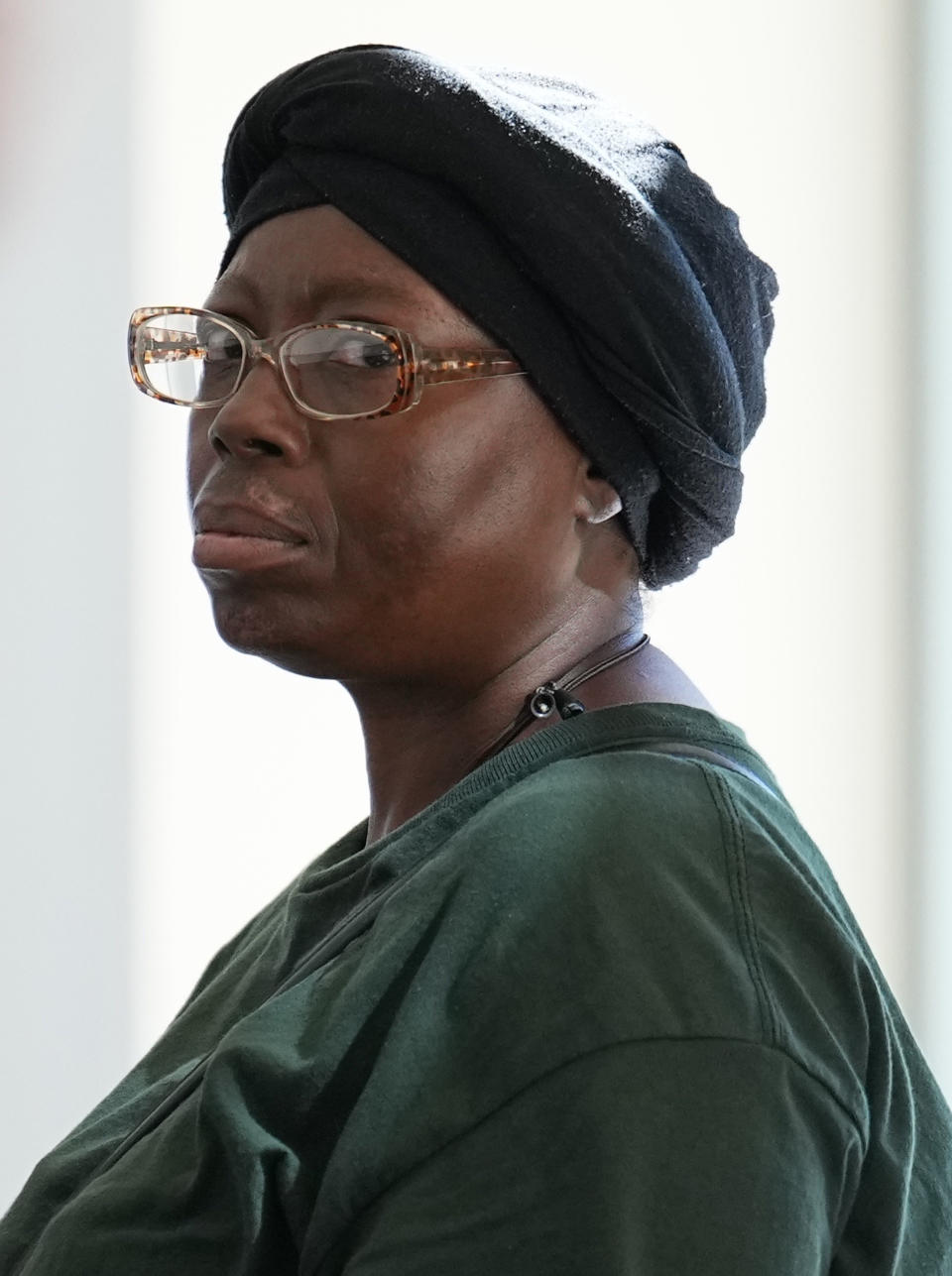 Sheneen McClain, mother of Elijah McClain, looks on outside the courtroom at the Adams County Justice Center for the start of a trial of two of the police officers charged in the death of McClain, Wednesday, Sept. 20, 2023, in Brighton, Colo. (AP Photo/Jack Dempsey)