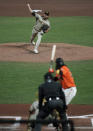 San Diego Padres starting pitcher Dinelson Lamet, top, throws to San Francisco Giants' Brandon Crawford during the first inning of the second game of a baseball doubleheader Friday, Sept. 25, 2020, in San Francisco. (AP Photo/Tony Avelar)