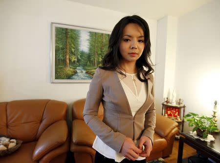 Miss World Canada Anastasia Lin poses before an interview at her home in Toronto, Ontario November 10, 2015. REUTERS/Chris Helgren