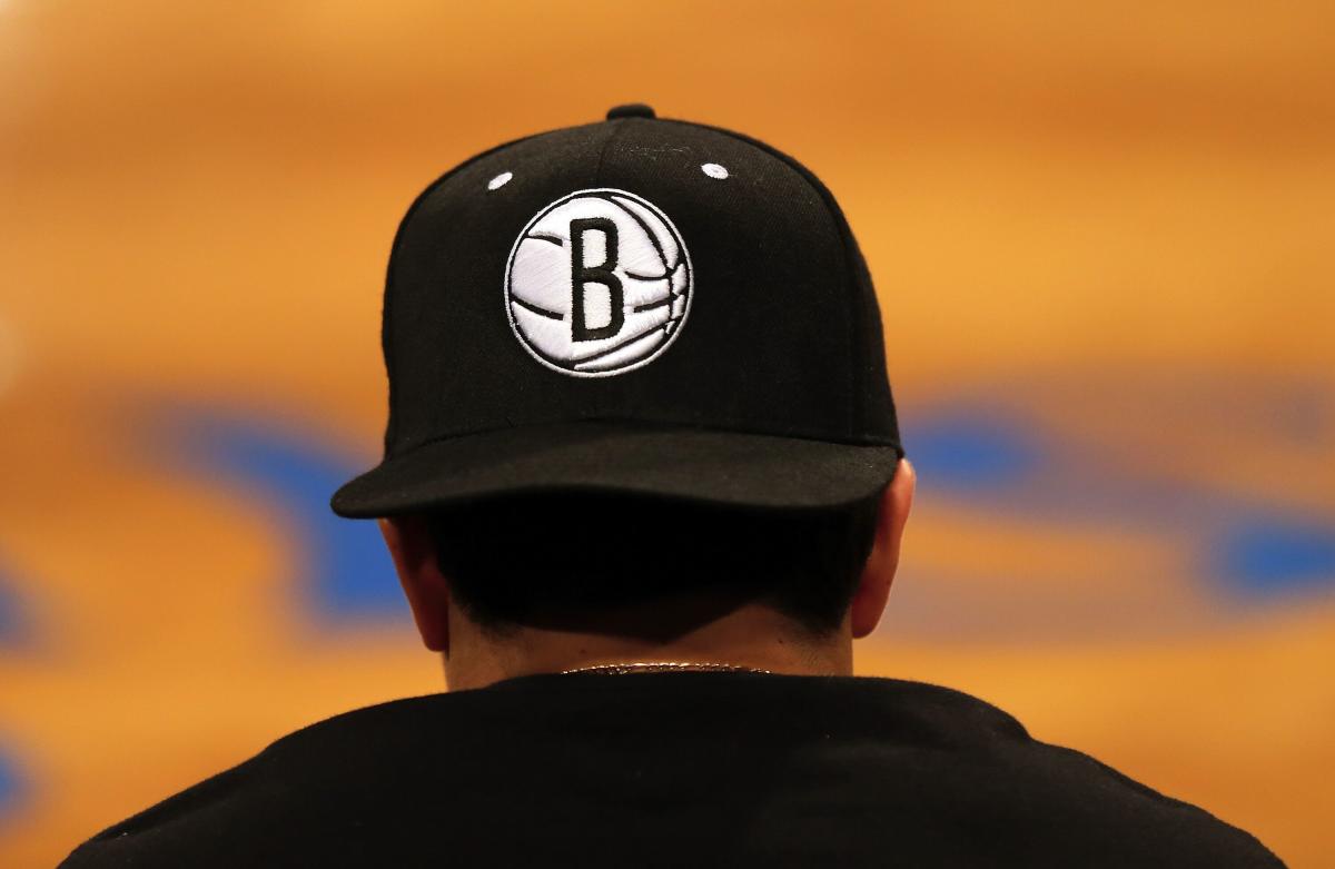 Koch family invests  billion in Brooklyn Nets owner