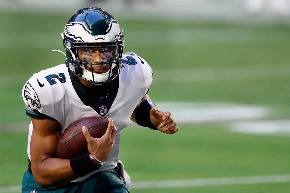 GLENDALE, ARIZONA - DECEMBER 20: Quarterback Jalen Hurts #2 of the Philadelphia Eagles scrambles with the football against the Arizona Cardinals during the third quarter of the NFL game at State Farm Stadium on December 20, 2020 in Glendale, Arizona. The Cardinals defeated the Eagles 33-26. (Photo by Christian Petersen/Getty Images)