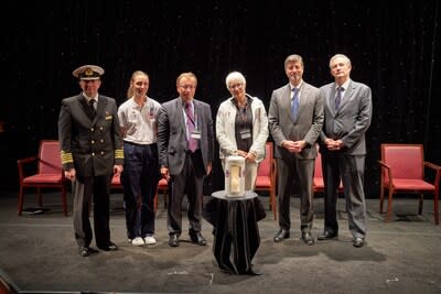 In a ceremony marking the arrival of the Eternal Flame in New York to commemorate the 80th Anniversary of D-Day. Shown left to right: Queen Mary 2 Captain Andrew Hall; Young French representative Lou Bordet-Guillou and Hervé Racat from La Flamme de la Liberté; General Patton’s granddaughter Helen Ayer-Patton; Commissioner for International Affairs, City of New York, Edward Mermelstein; and French Ambassador to the U.S. Laurent Bili.